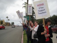 Garfield teachers Emily Neidhart, center, and Michelle Sanchez picketed outside the Ed. Center in support of SDEA's bargaining proposal.